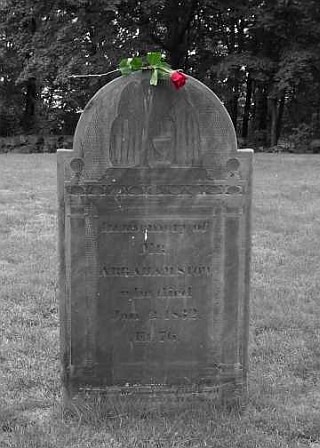 Photograph of an old gray slate gravestone